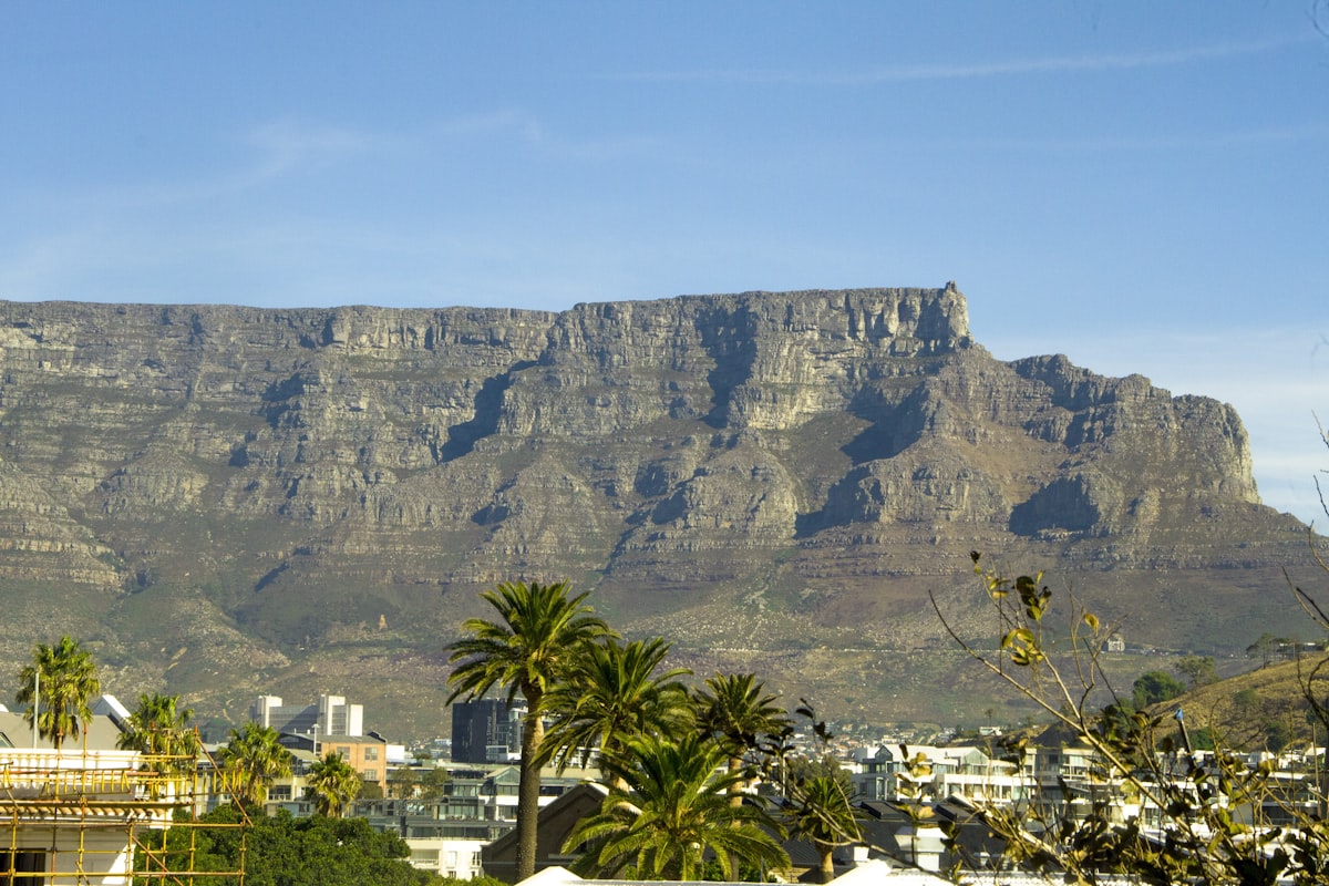 The Cape Town waterfront at sunset with Table Mountain in the background and the harbour in the foreground