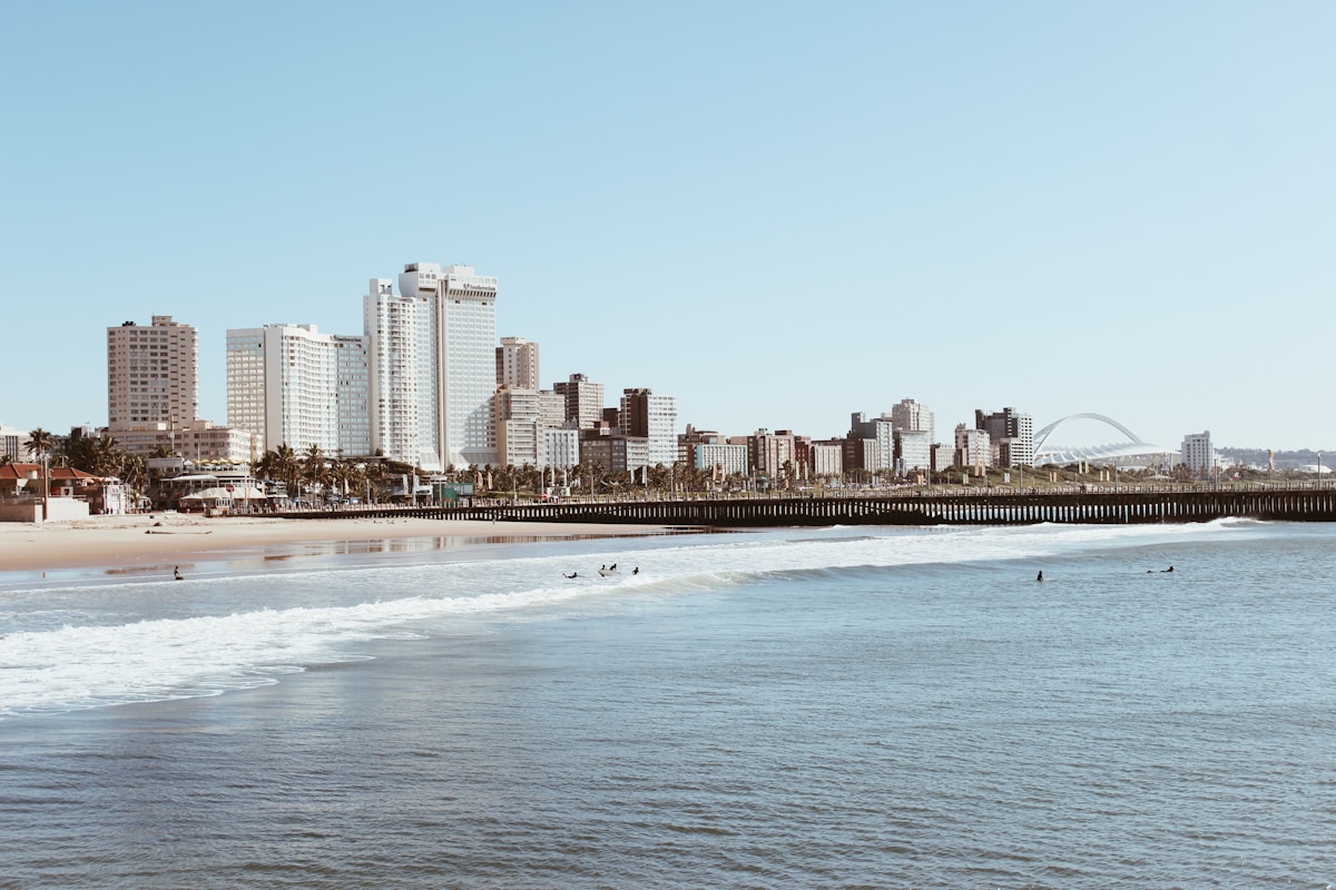 The Oyster Box Hotel in Umhlanga with its pool terrace and the famous lighthouse in the background